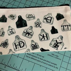 Small cosmetic bag with western design